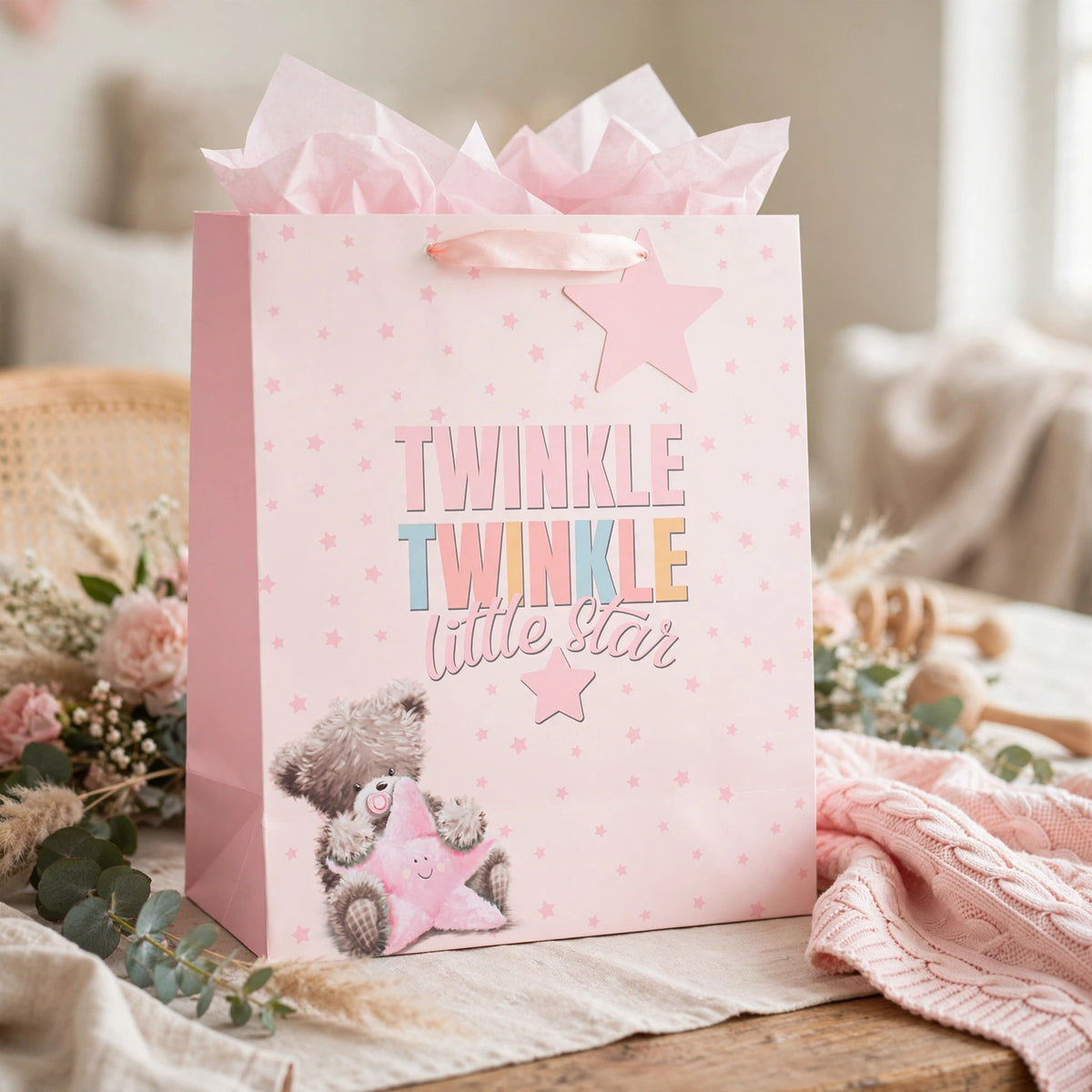 Pink gift bag with Little Star Girl design used for baby girl celebration gifts