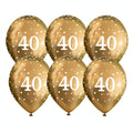 Gold 40th birthday balloons with white number 40 and sparkle details