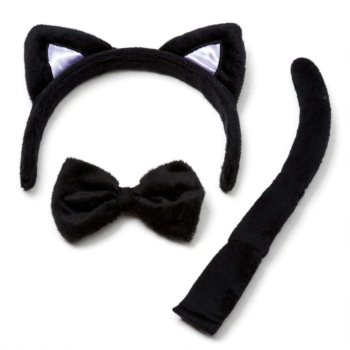 Close-up view of Halloween cat ears, tail, and bow tie accessories