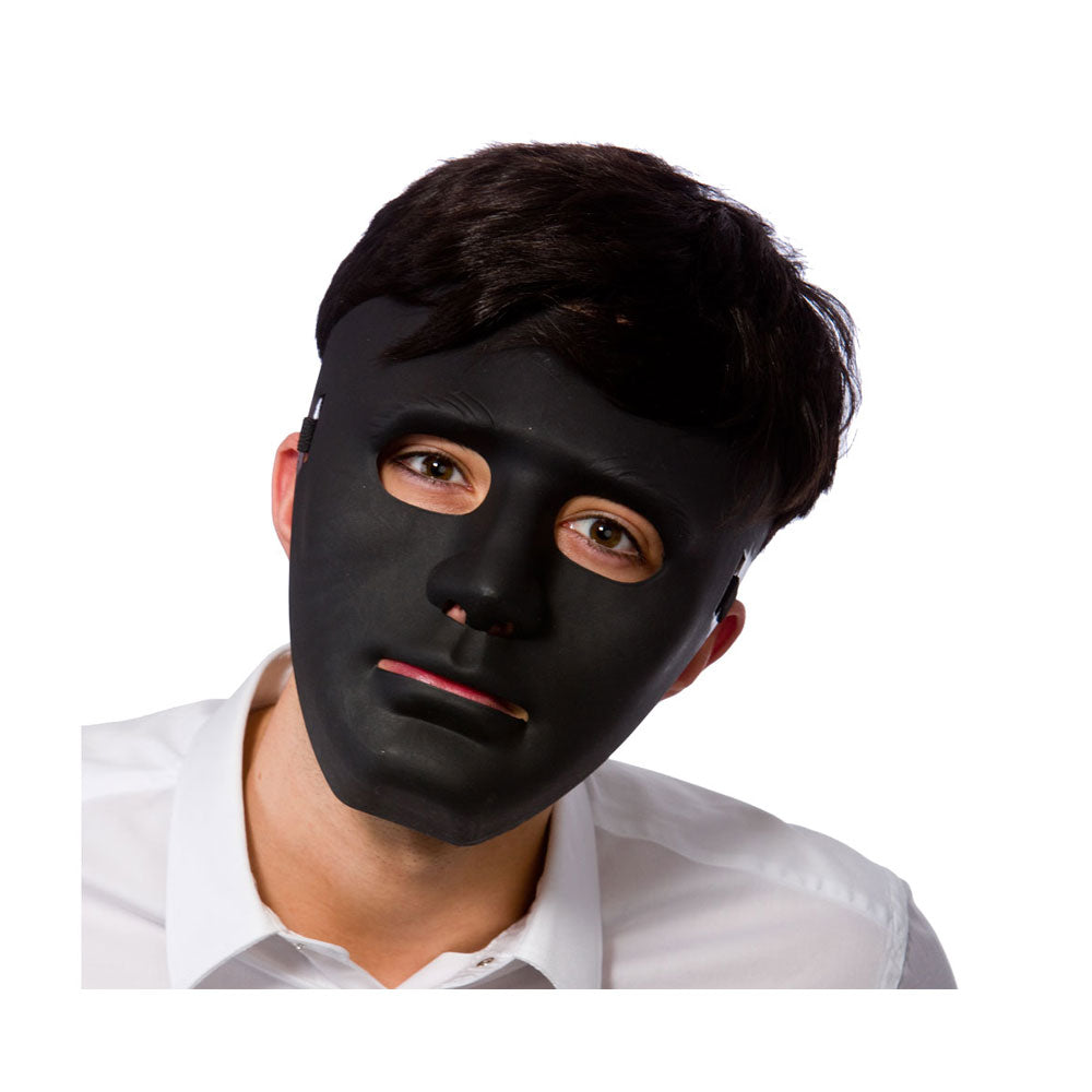 A man wearing a black full-face mask with cutouts for the eyes, nose, and mouth, shown against a plain white background.