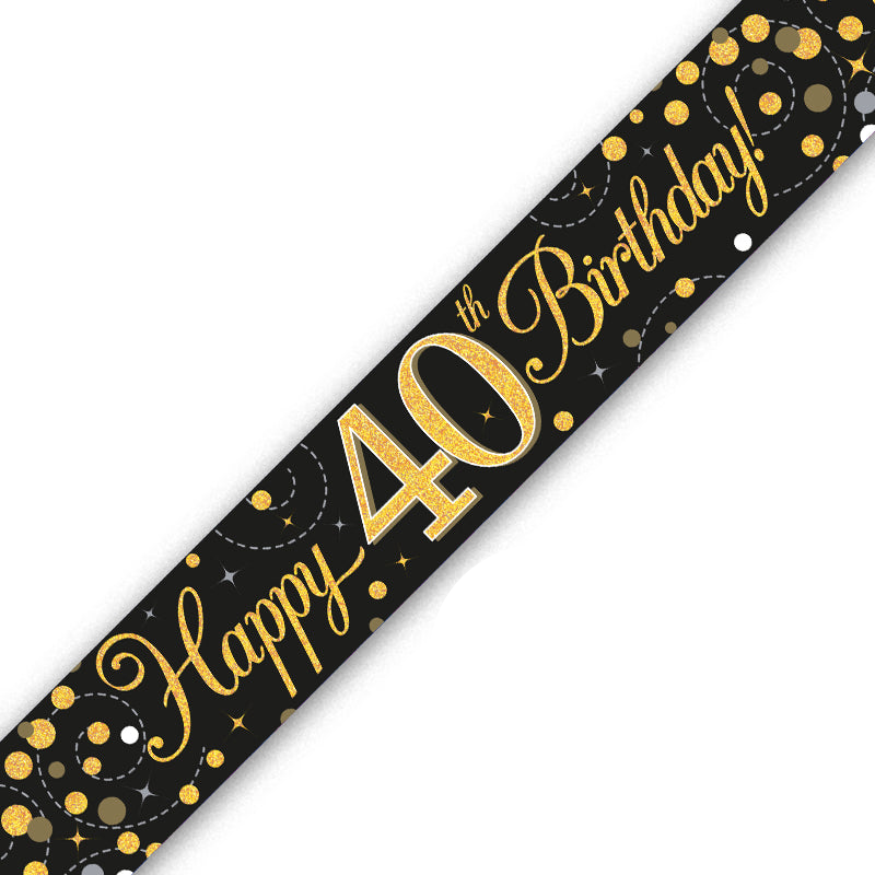 A black 40th birthday banner or sash printed with 'Happy 40th Birthday!' in gold script and numbers, decorated with gold and silver confetti dots, shown diagonally on a white background.