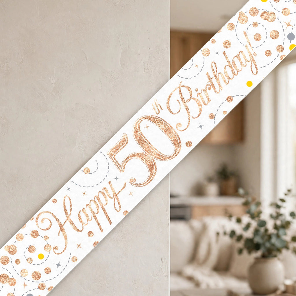 Oaktree Sparkling Fizz 50th Birthday Banner displayed as party decoration in rose gold and white