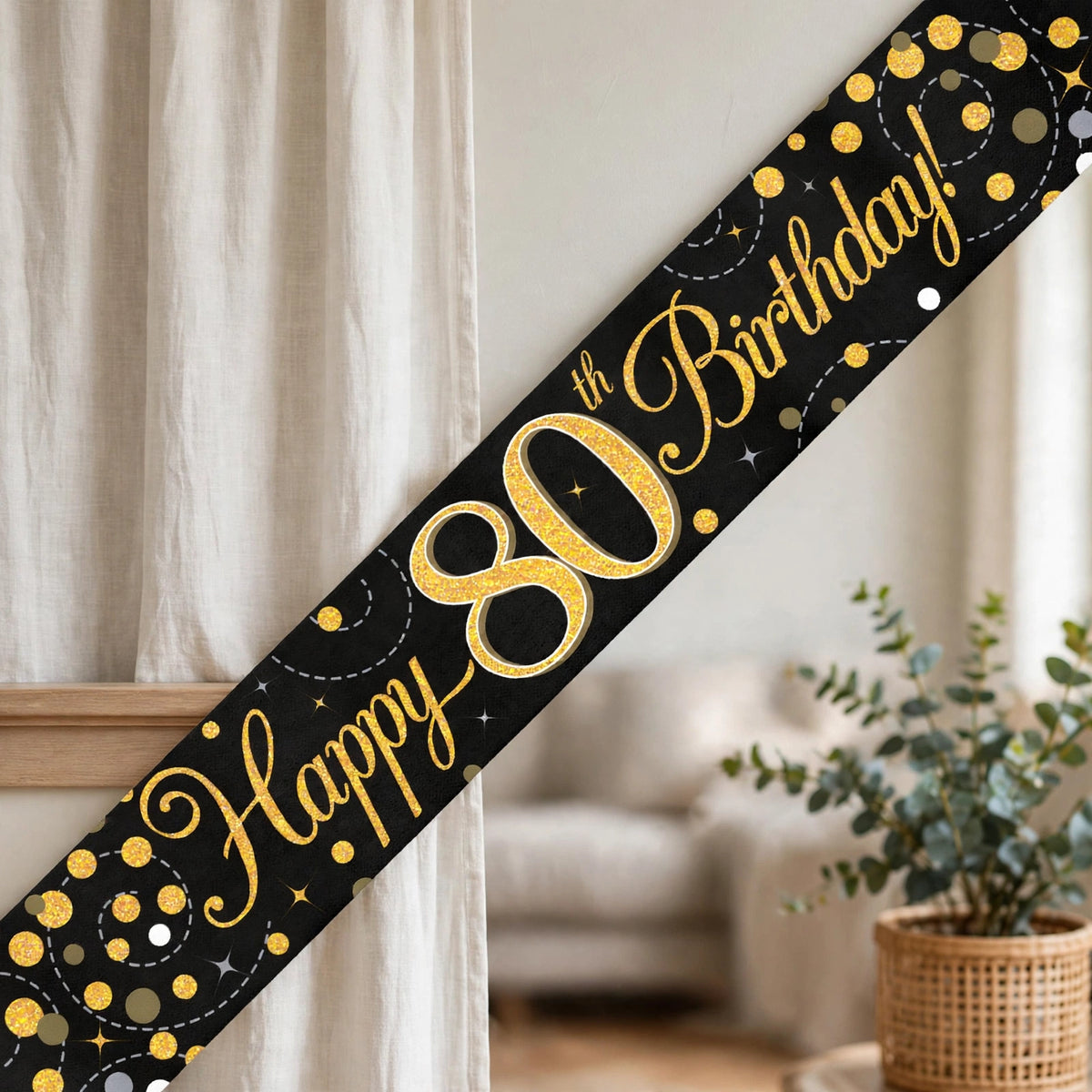 Oaktree Sparkling Fizz 80th Birthday Banner displayed at a birthday celebration