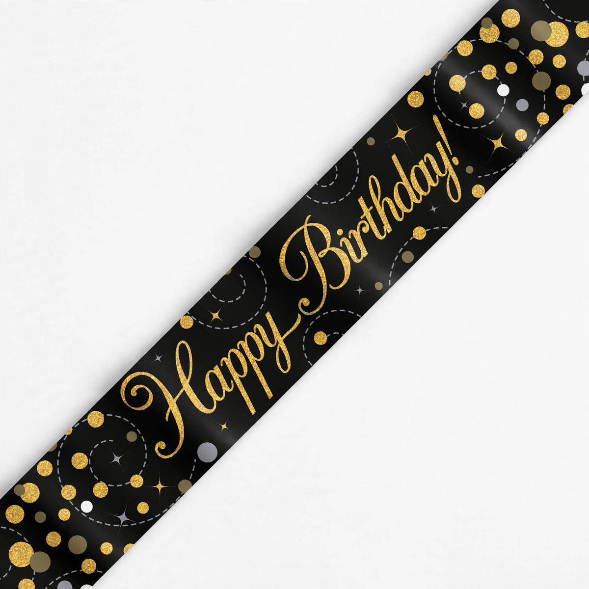 Detail view of black and gold Happy Birthday banner