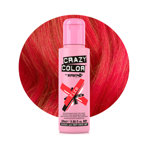 Pink bottle of Crazy Color hair dye with red hair in the background