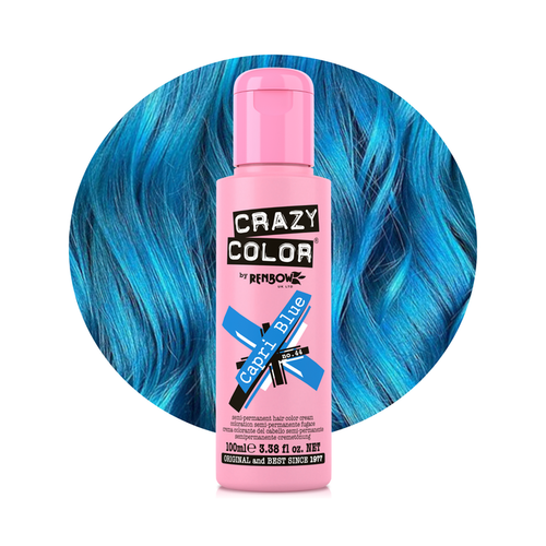 Pink bottle of Crazy Color hair dye with blue hair in the background