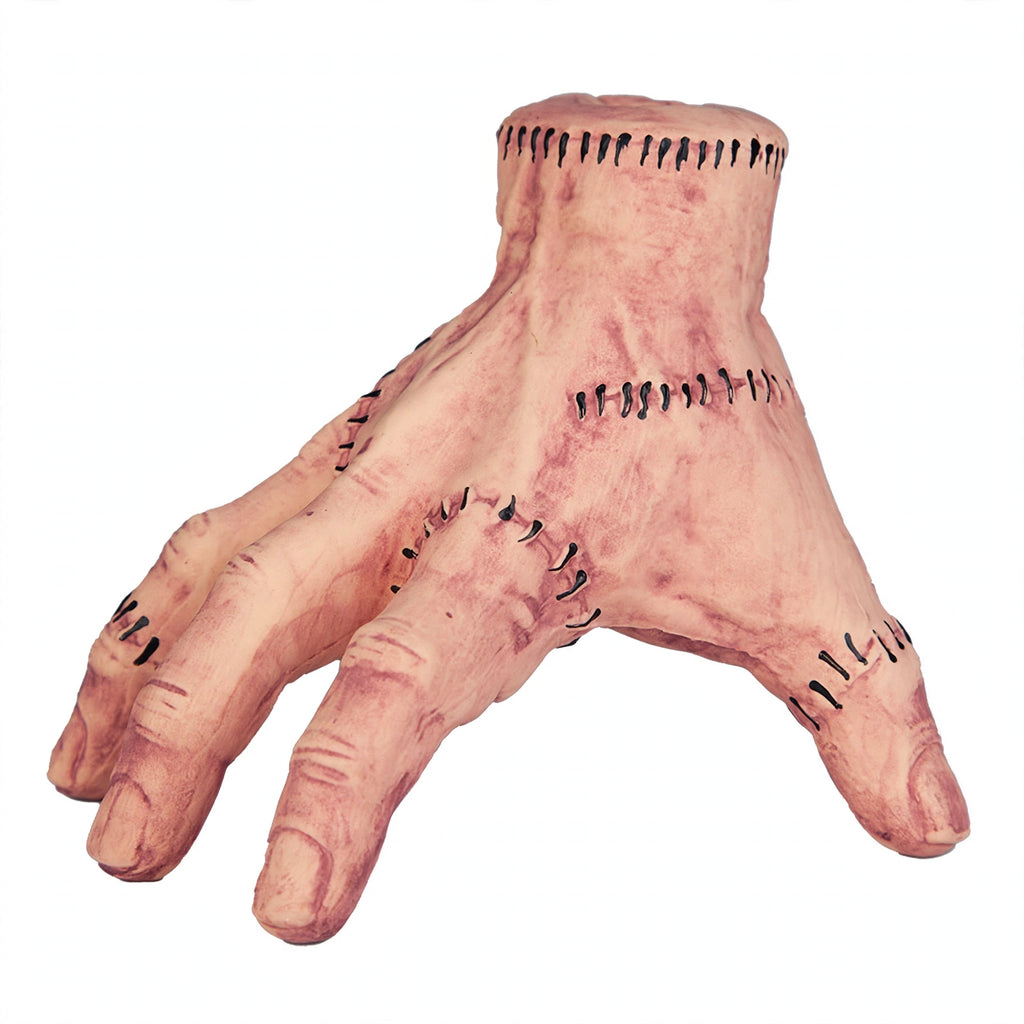close-up view of The Thing latex prop hand showing fingernails and knuckle detail