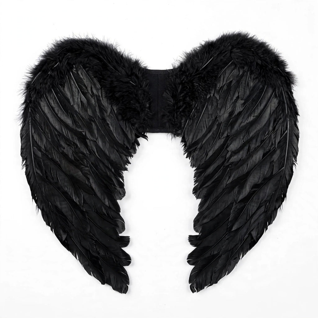 Close-up view of black feather angel wings with elastic straps