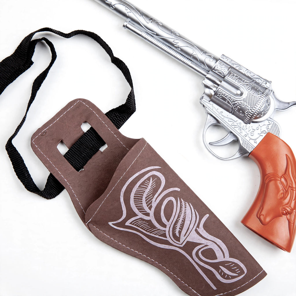 Close-up of adults cowboy gun and holster set showing distressed leather-look and metallic accents