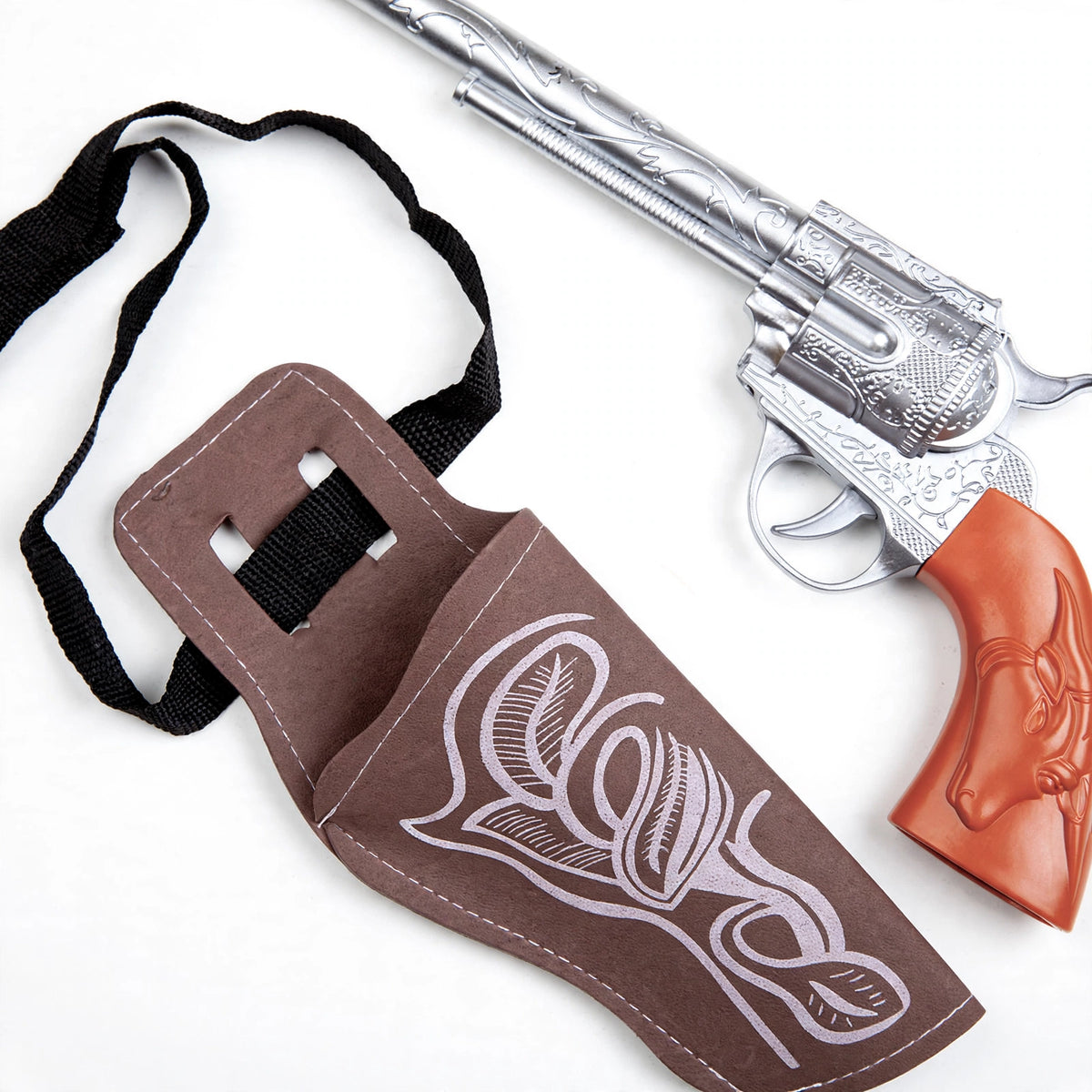 Close-up of adults cowboy gun and holster set showing distressed leather-look and metallic accents