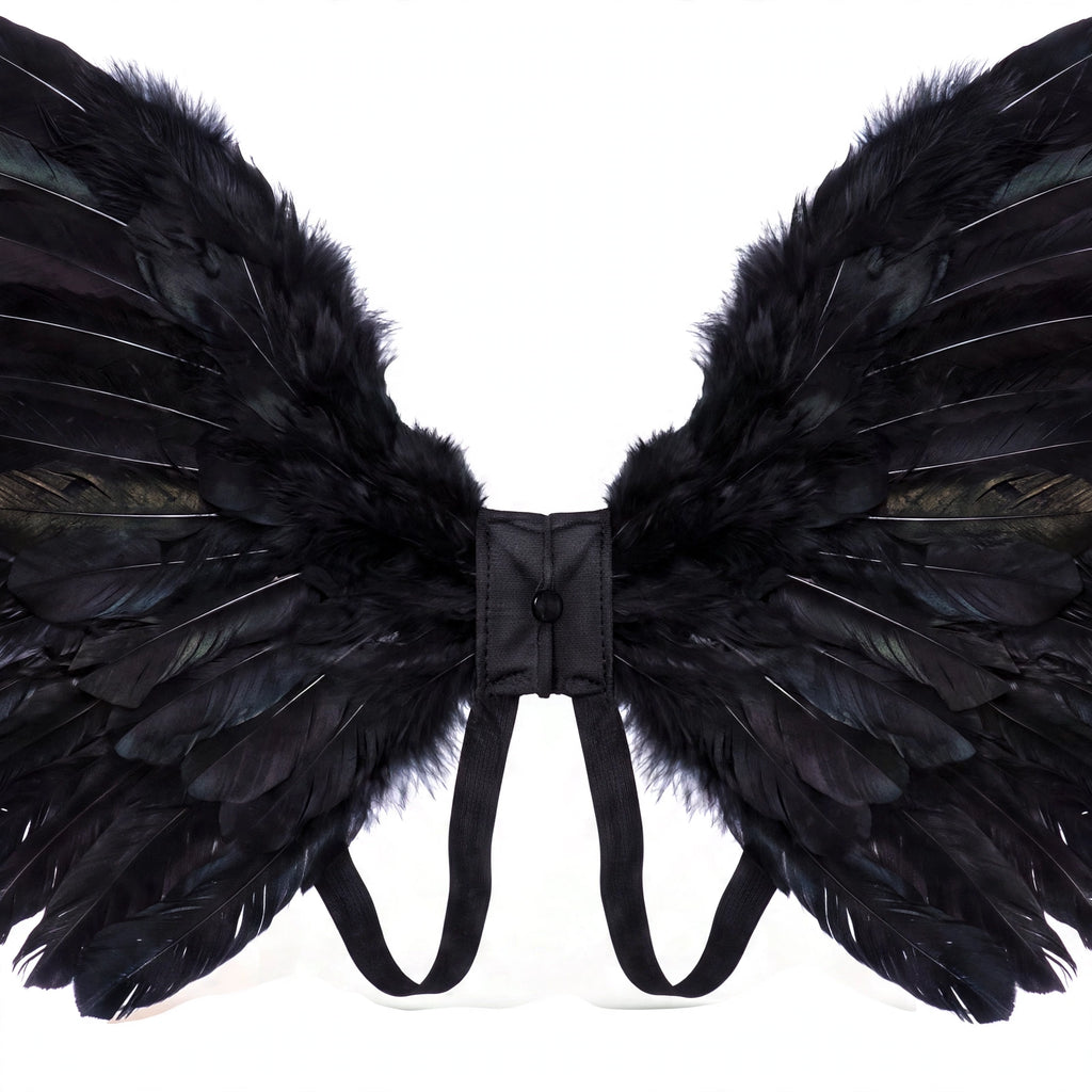 Close-up view of black feather angel wings with elastic straps