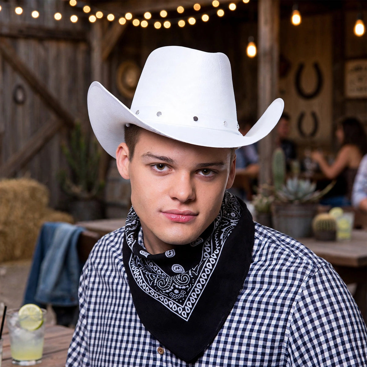 Adults white Texan cowboy hat worn for western-themed parties and events