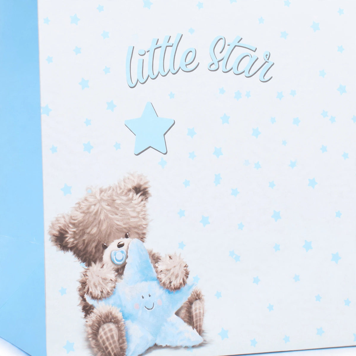 Close-up of Little Star Boy design on large blue gift bag