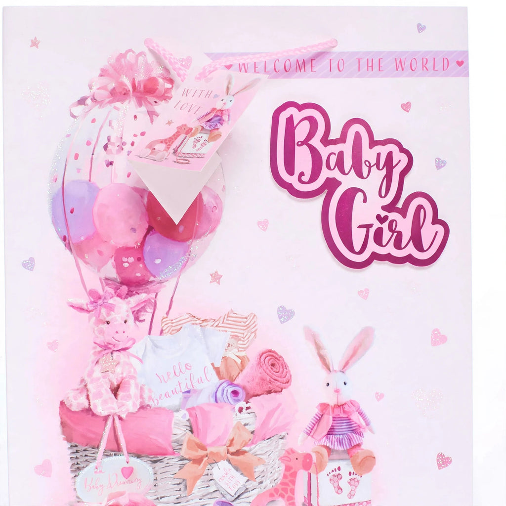 Close-up view of the Wraptastic Baby Girl Pink Gift Bag Icons Medium showing icon print