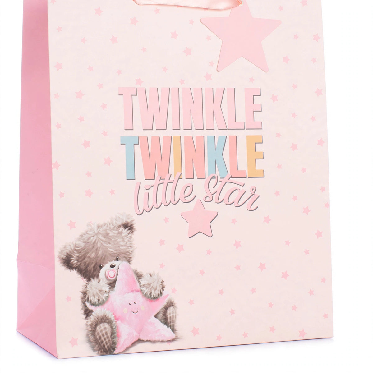 Close-up view of pink gift bag featuring Little Star Girl design