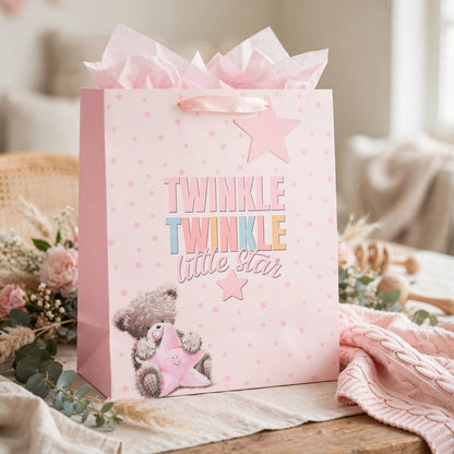 Pink gift bag with Little Star Girl design used for baby girl celebration gifts