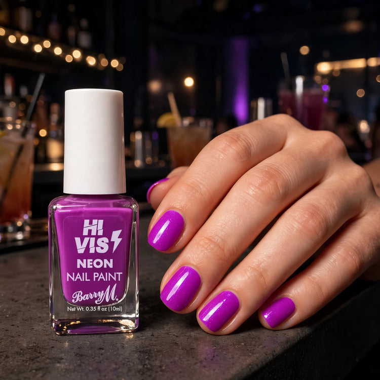 Barry M Purple Hi-Vis Nail Polish worn to create neon-bright purple nails for parties or nights out