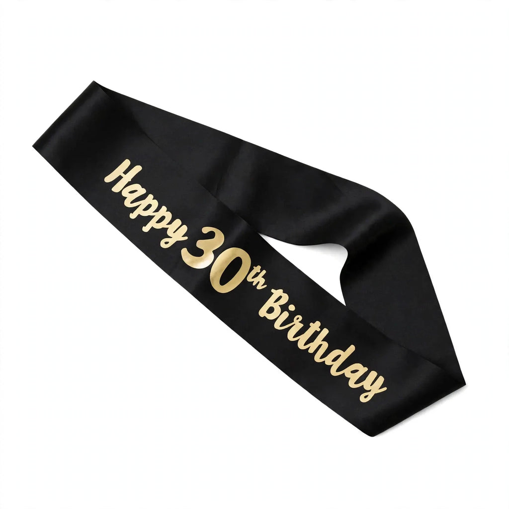 Black and gold 30th birthday sash worn diagonally over one shoulder