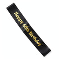 Black and gold 60th birthday sash with diagonal style worn over one shoulder