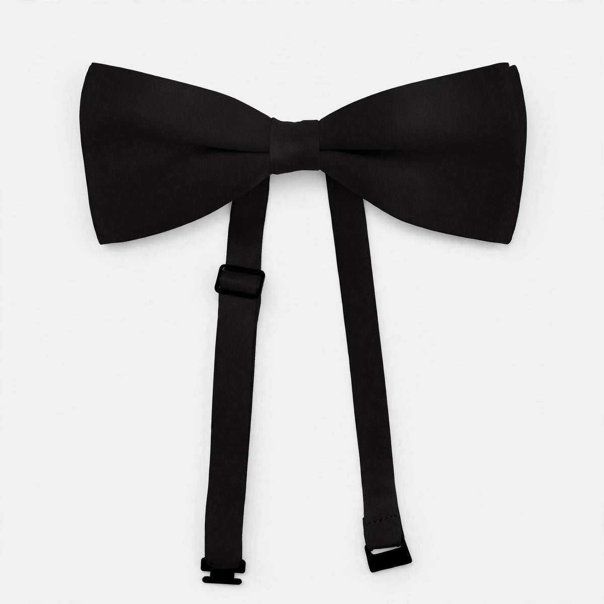 Close-up view of black bow tie showing its shape