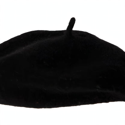 Black French beret styled to the side