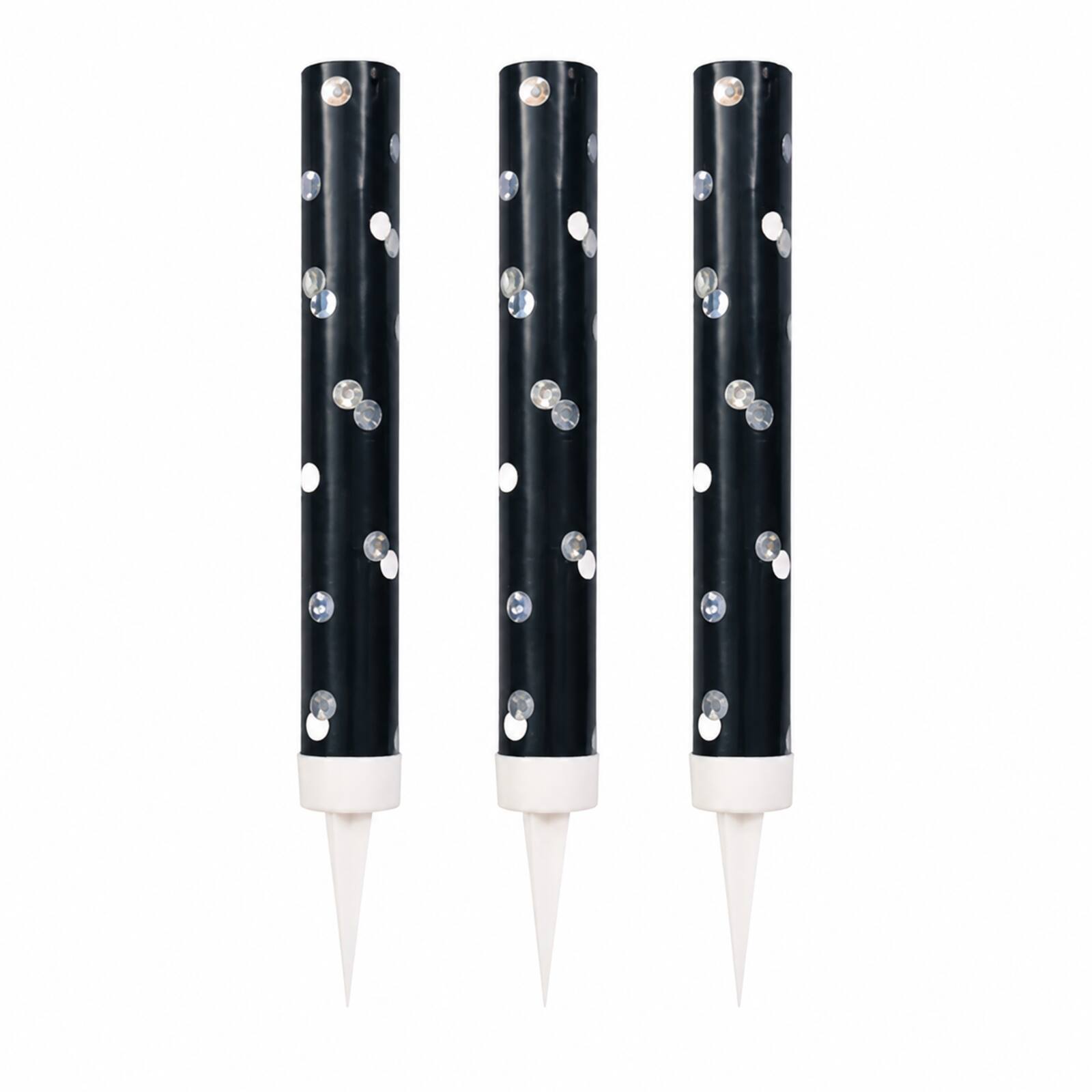 Three black cake fountains showing silver dots collars and spikes