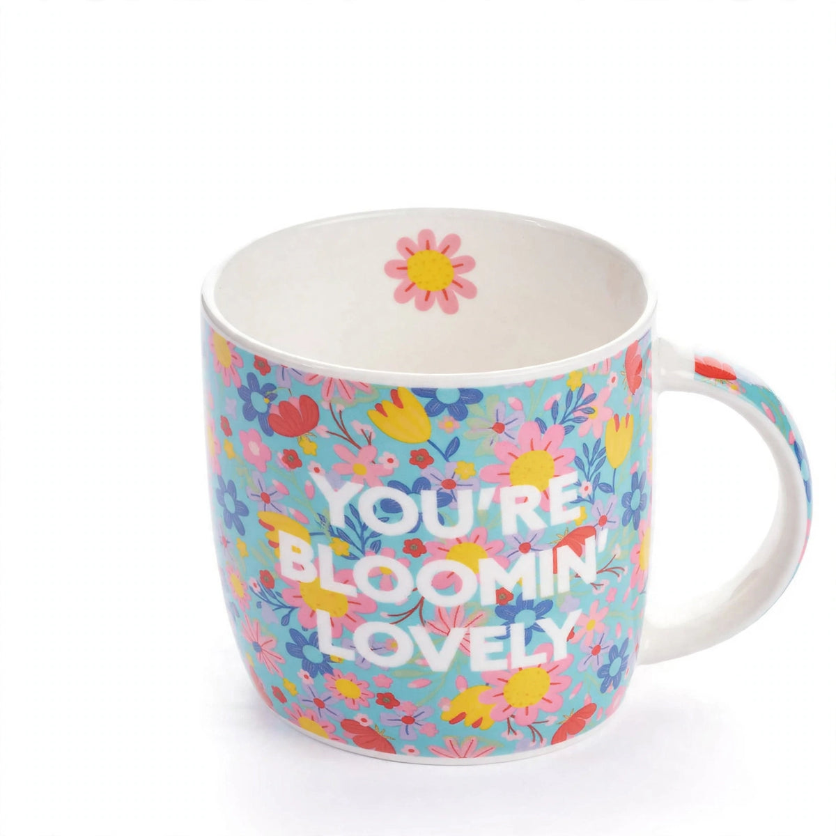 Close-up view of Tiger ceramic mug with floral design and You're Blooming Lovely message