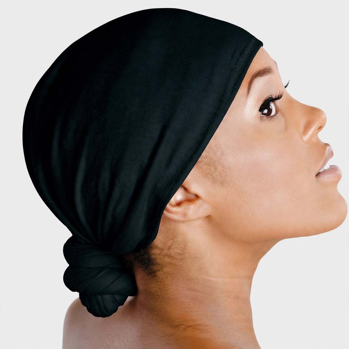 close-up view of black cotton durag with knot-on design