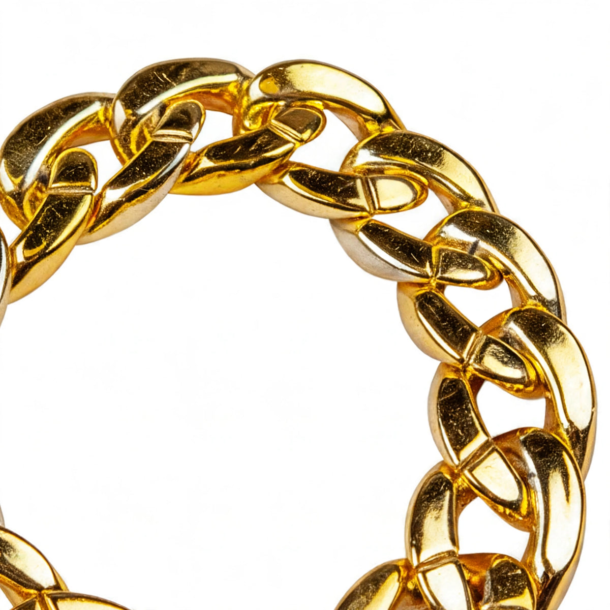Close-up view of chunky gold plastic bracelet with oversized chain links