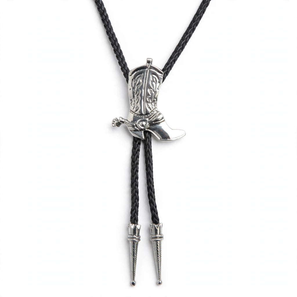 Close-up view of cowboy boot shaped slide on bolo tie