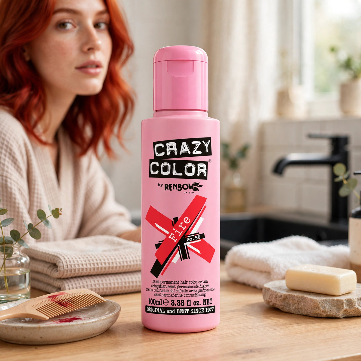 Crazy Color Fire Red hair dye displayed in a bathroom setting with hair coloring tools