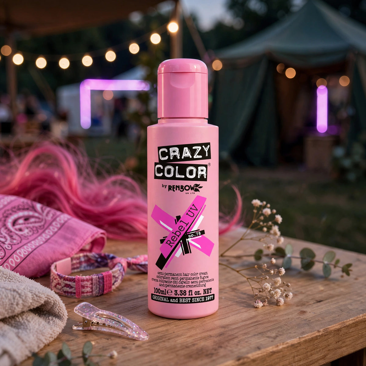 Crazy Color Rebel UV Neon Pink hair dye applied to hair under UV blacklight