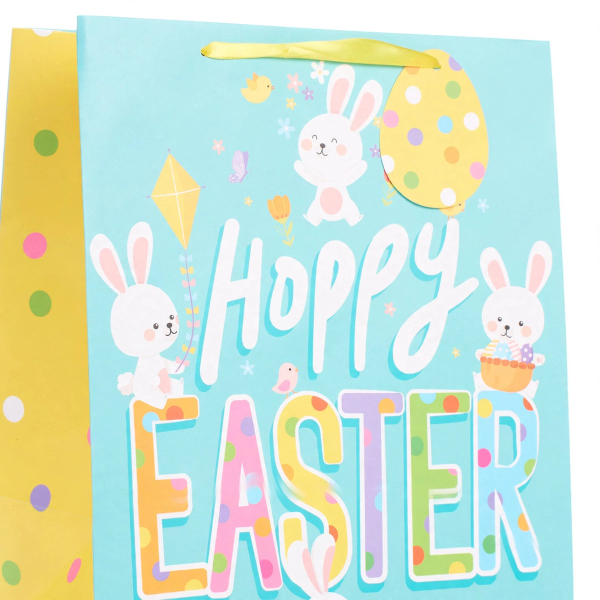 Close-up of multi-coloured Easter bunny design on medium Easter gift bag