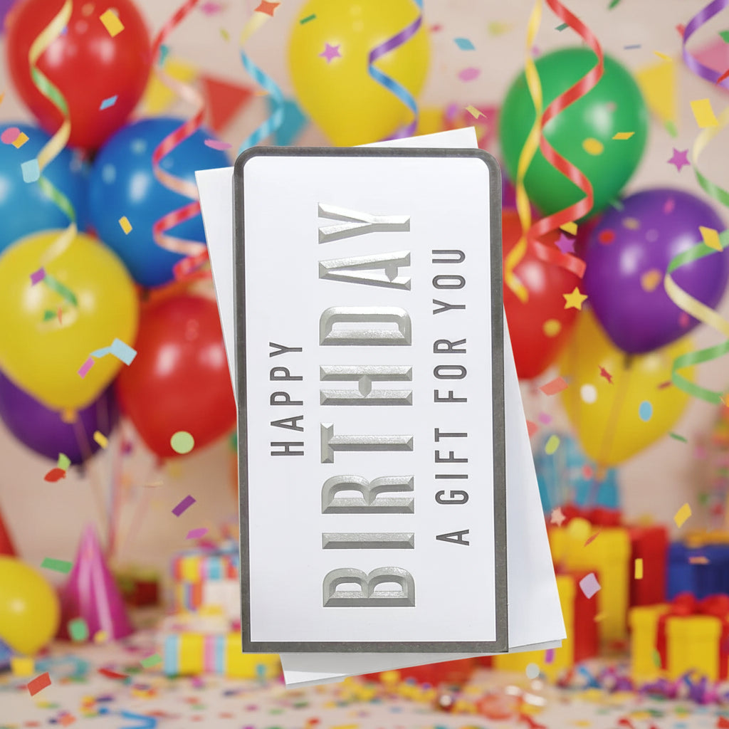 White gift card with 'Happy Birthday' text in silver on a white background