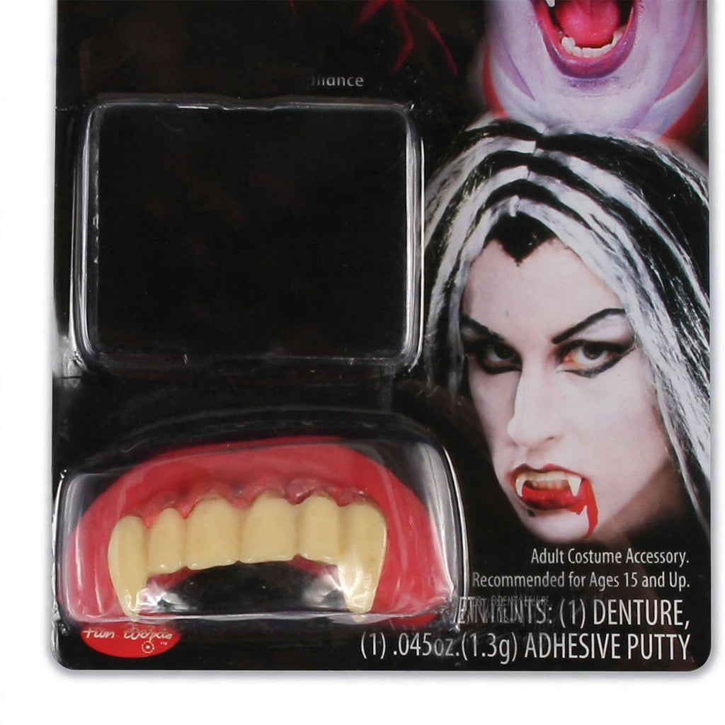 Close-up view of Funworld Deluxe Vampire Teeth Dentures and Adhesive showing vampire teeth and adhesive