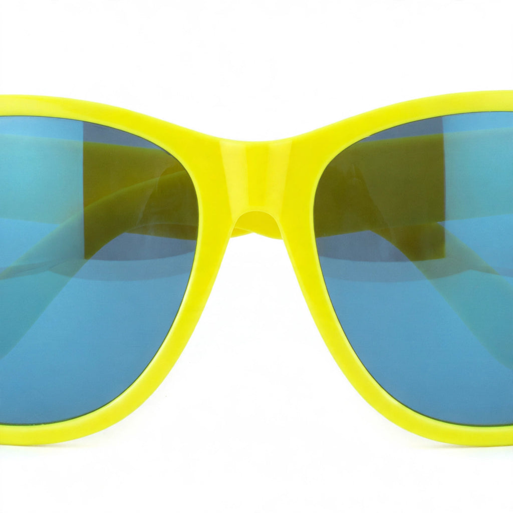 Close-up view of giant plastic clown neon glasses in a random neon colour