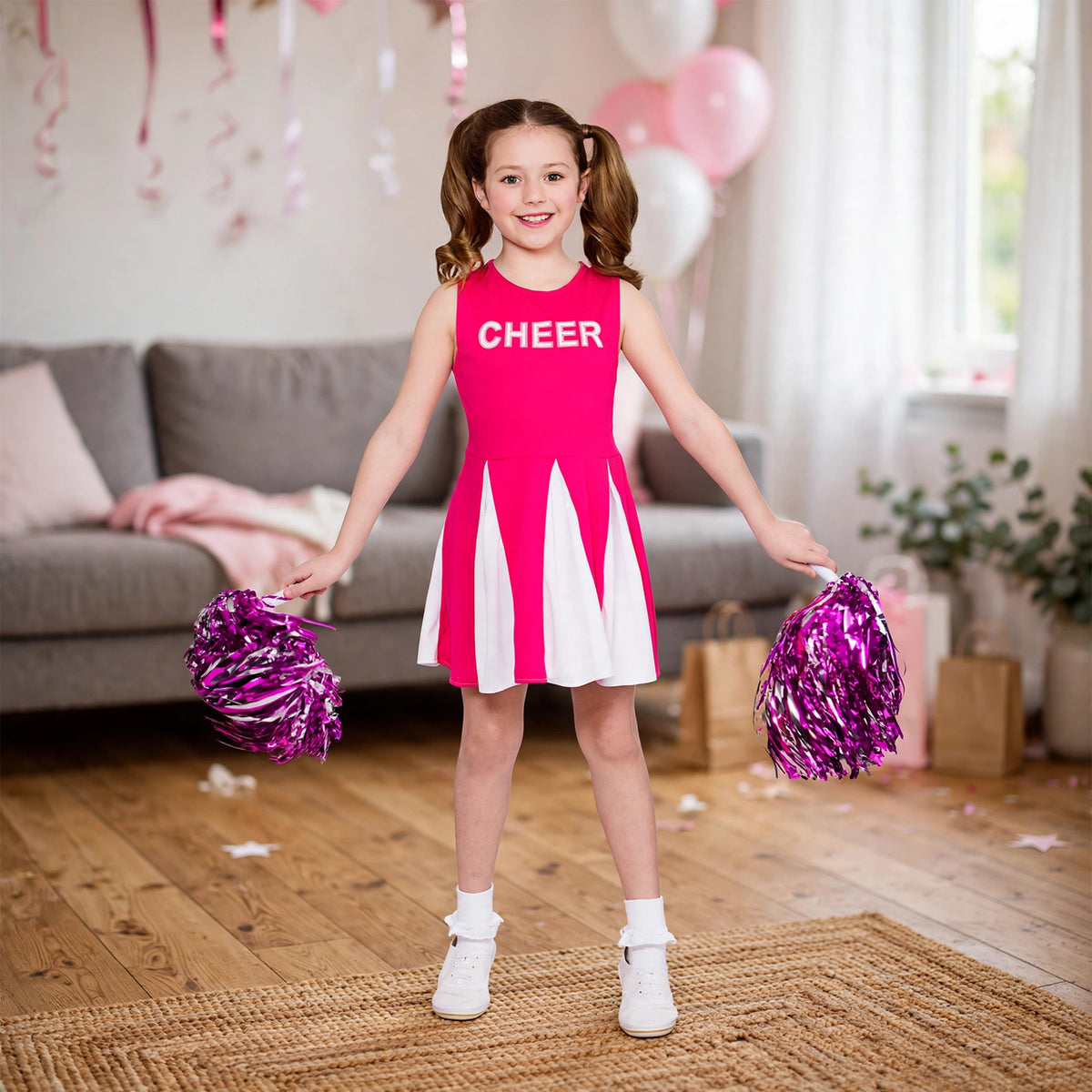 Girl wearing hot pink cheerleader dress at a themed celebration