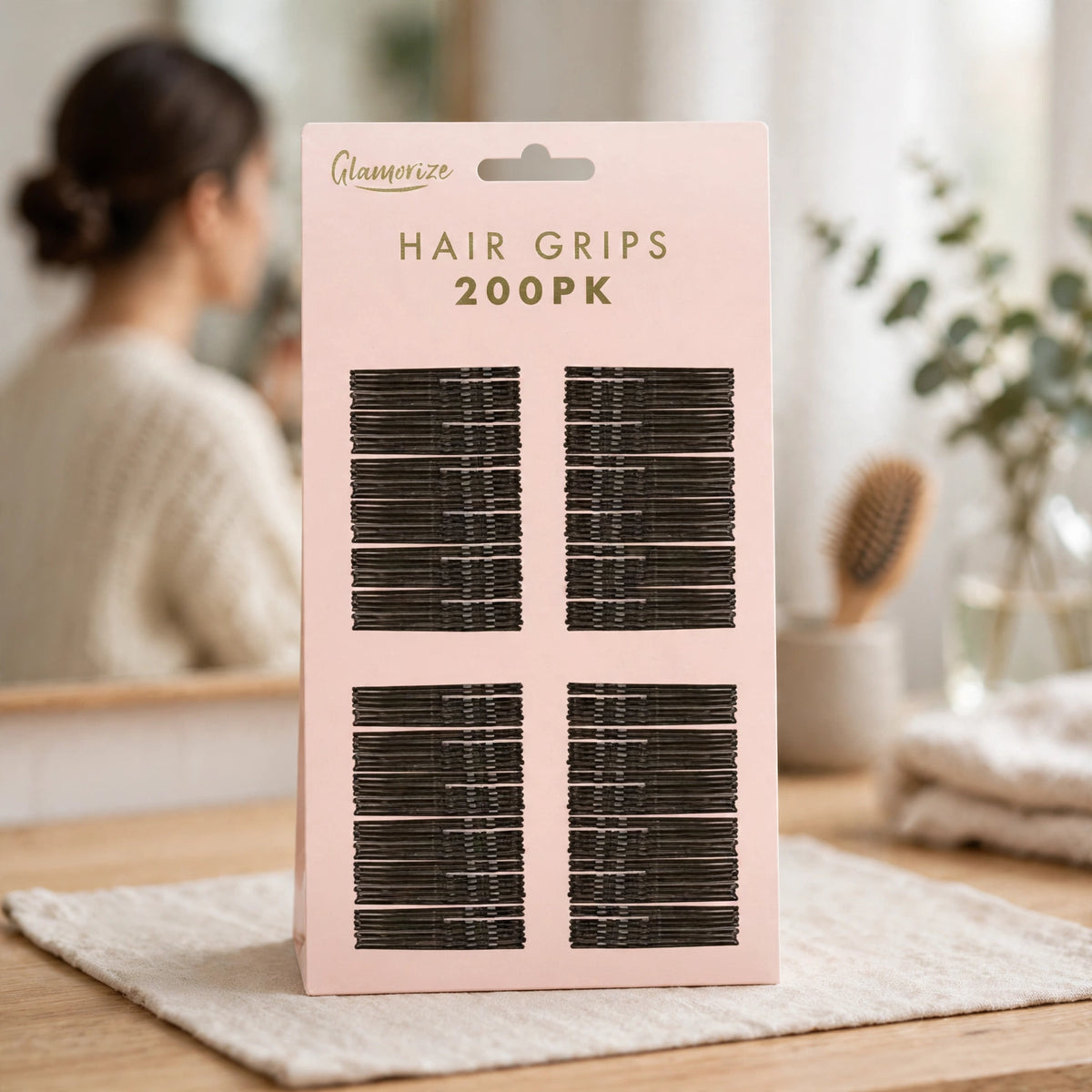 Glamorize Secure Hold Black Hair Grips used in hairstyles like updos, buns, and braids