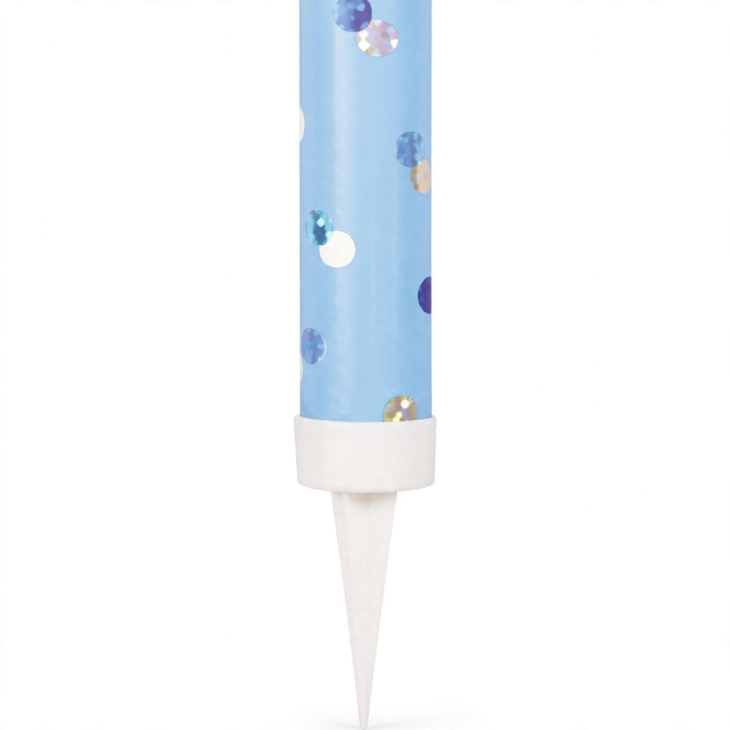 Close-up of blue ice fountain cake decoration with reflective dots and pointed spike