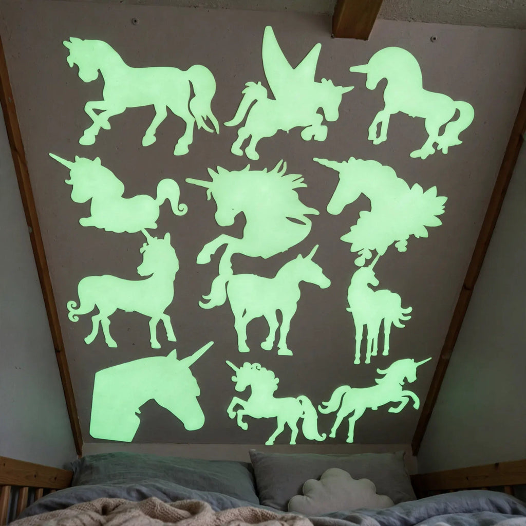 Glow In The Dark Stick On Unicorns applied on walls and ceiling in a child's bedroom