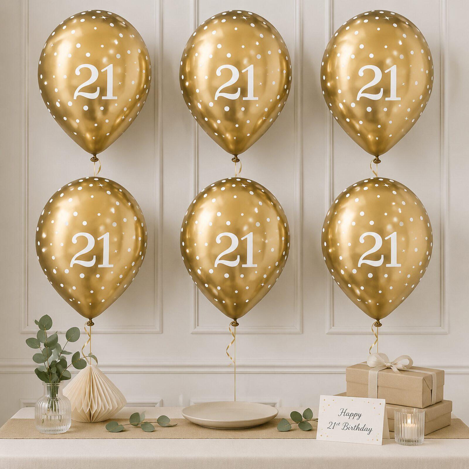 Six gold 21st birthday balloons arranged as a party backdrop