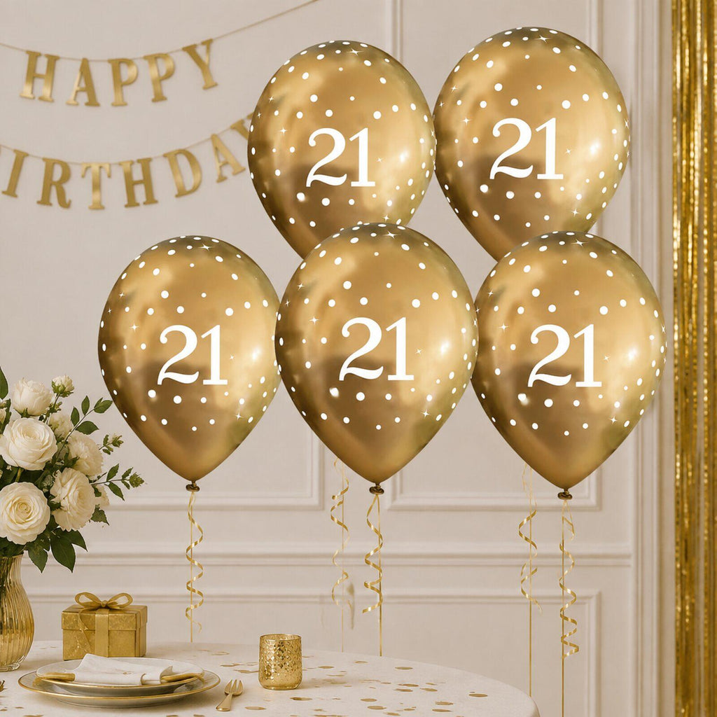 Gold number 21 balloons decorating an elegant 21st birthday party