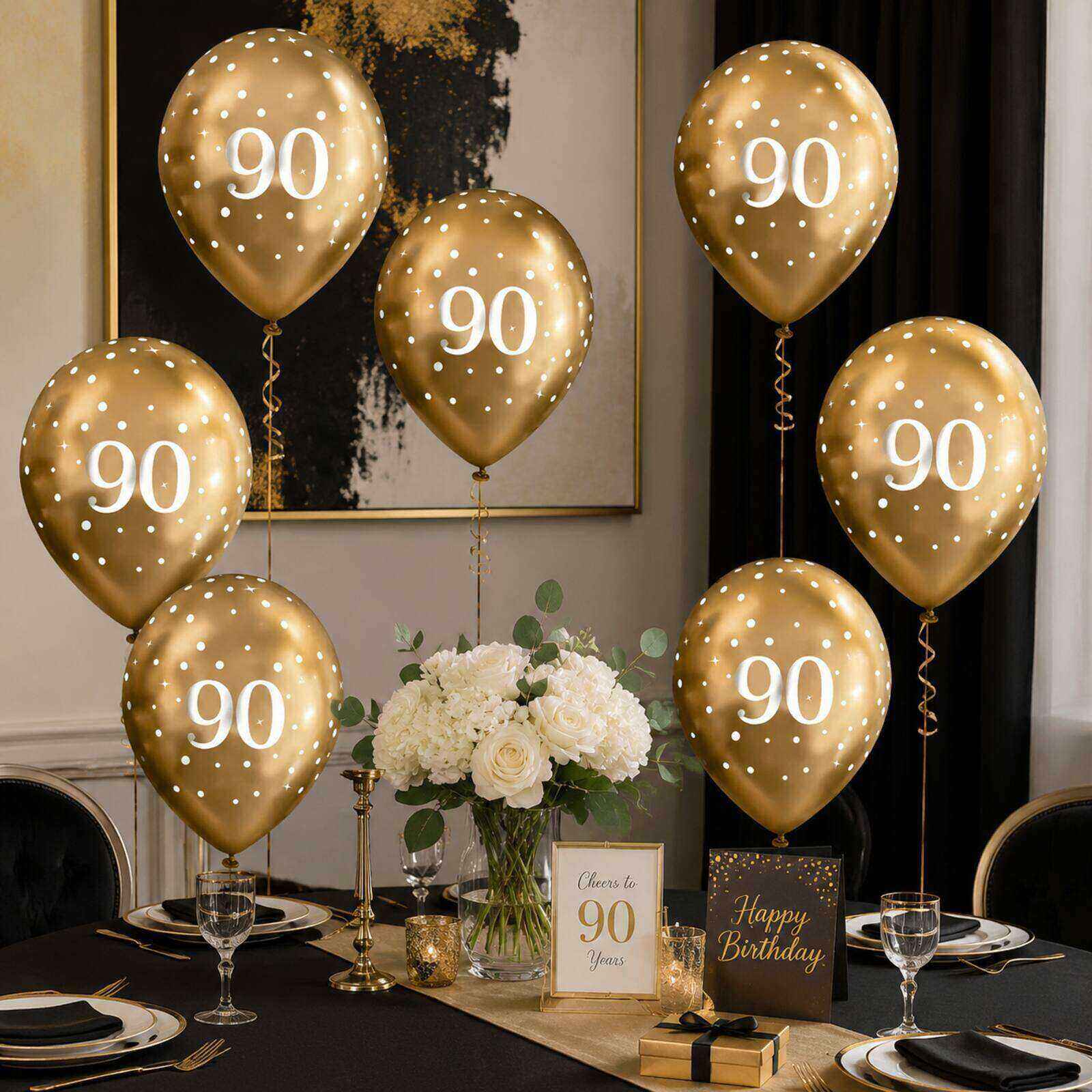 Six gold number 90 balloons in an elegant birthday party setting