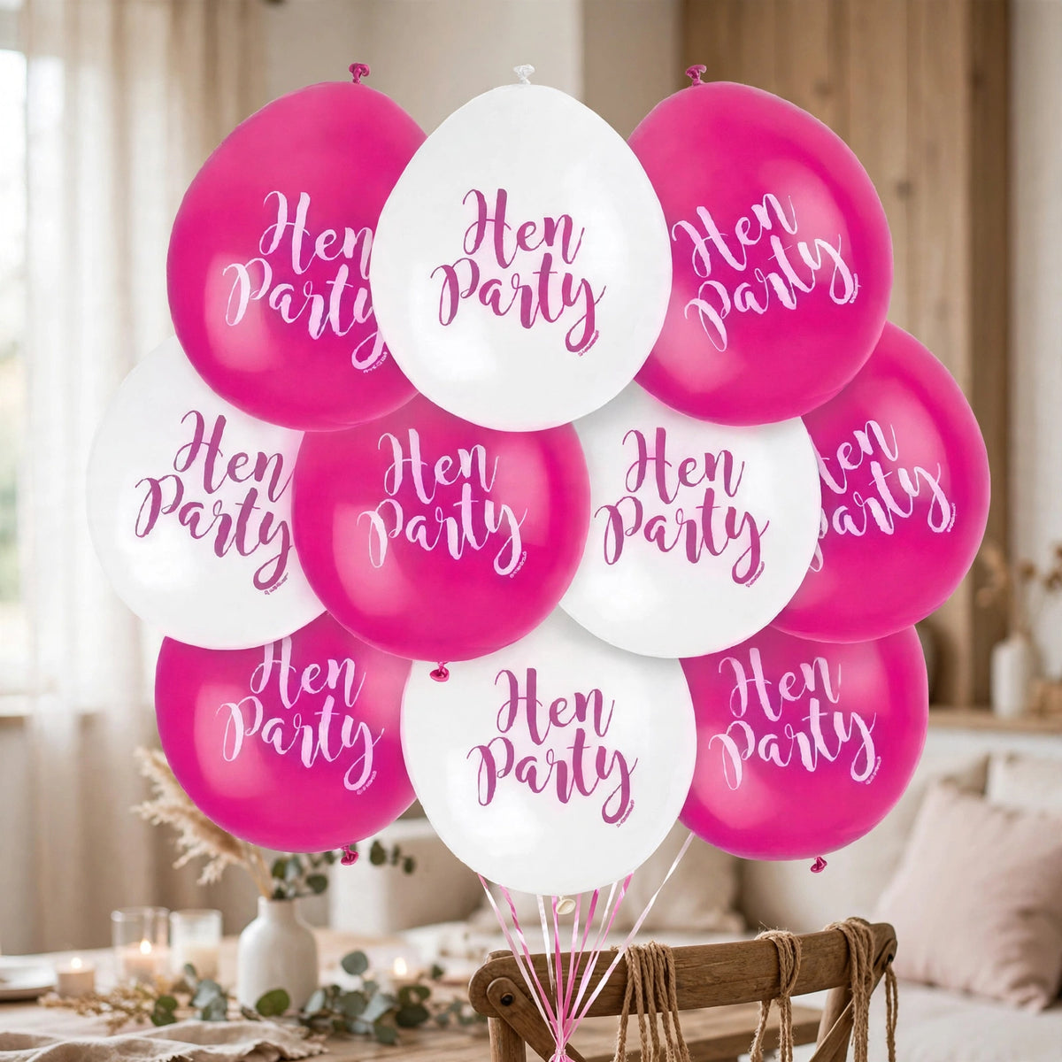 Pink and white latex balloons displayed as hen party decorations