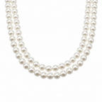 Pair of white pearl necklaces displayed on white background studio product shot