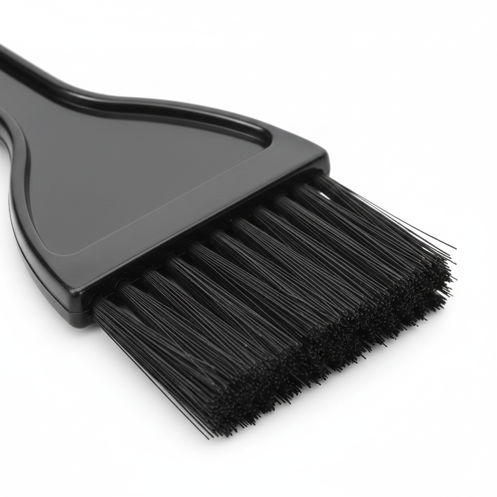 Extreme Close-Up Macro Detail of Black Hair Dye Tinting Brush Bristles and Spine