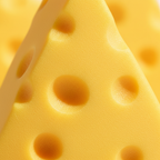 Extreme macro close-up of large squishy triangle cheese toy surface texture, cheddar yellow slow-rise foam detail