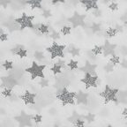 Extreme close-up of silver star print texture on white tissue paper