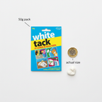 White Tack 50g flat lay with pound coin for scale showing packaging and putty