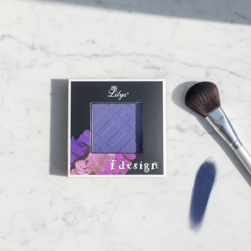 Lilyz Eyeshadow Mono Navy Blue on marble surface with makeup brush and colour swatch